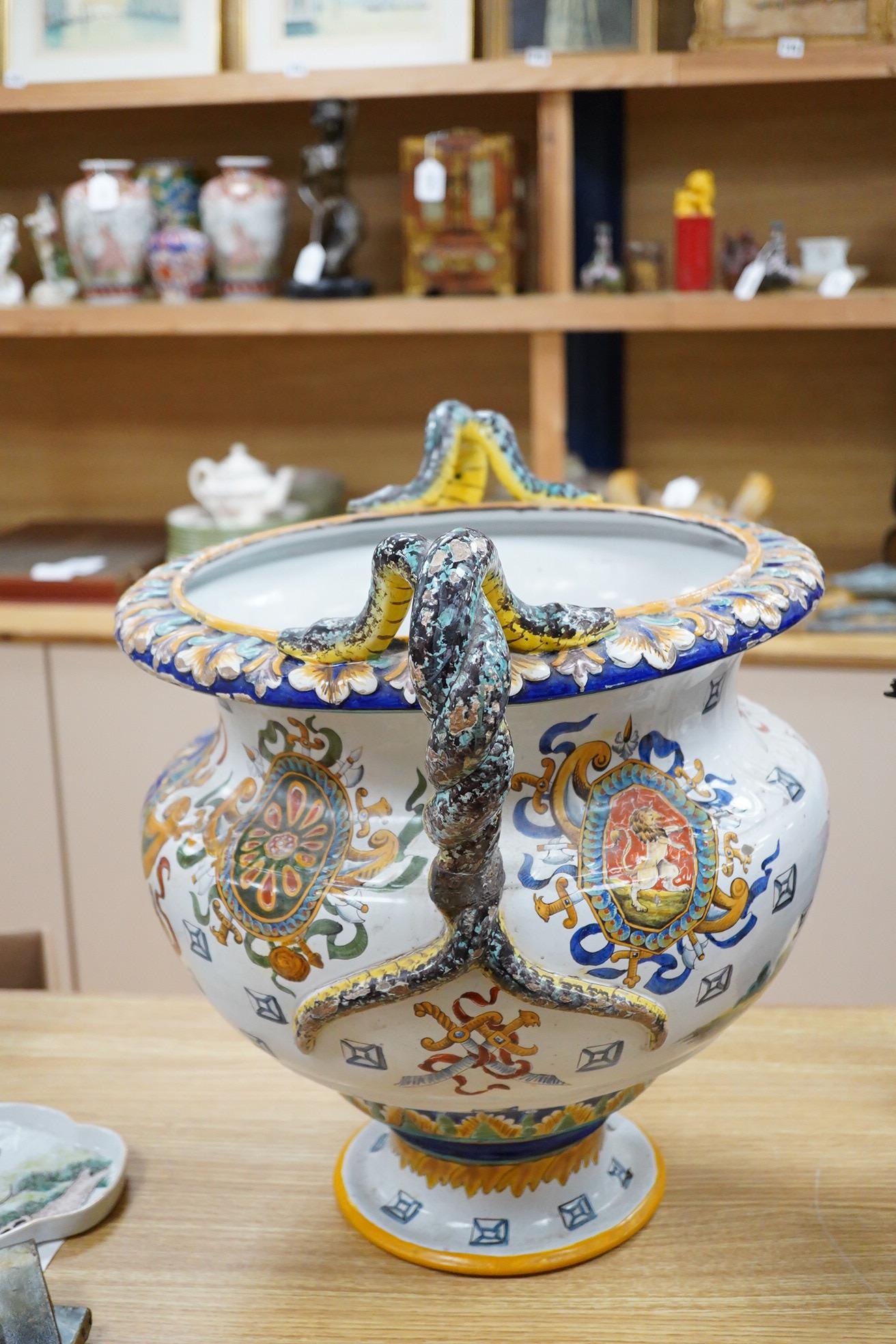 A large French faience twin snake handled pedestal planter, 47cm high